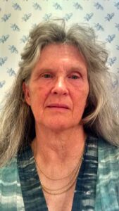 Eve Burton, a woman with gray long hair